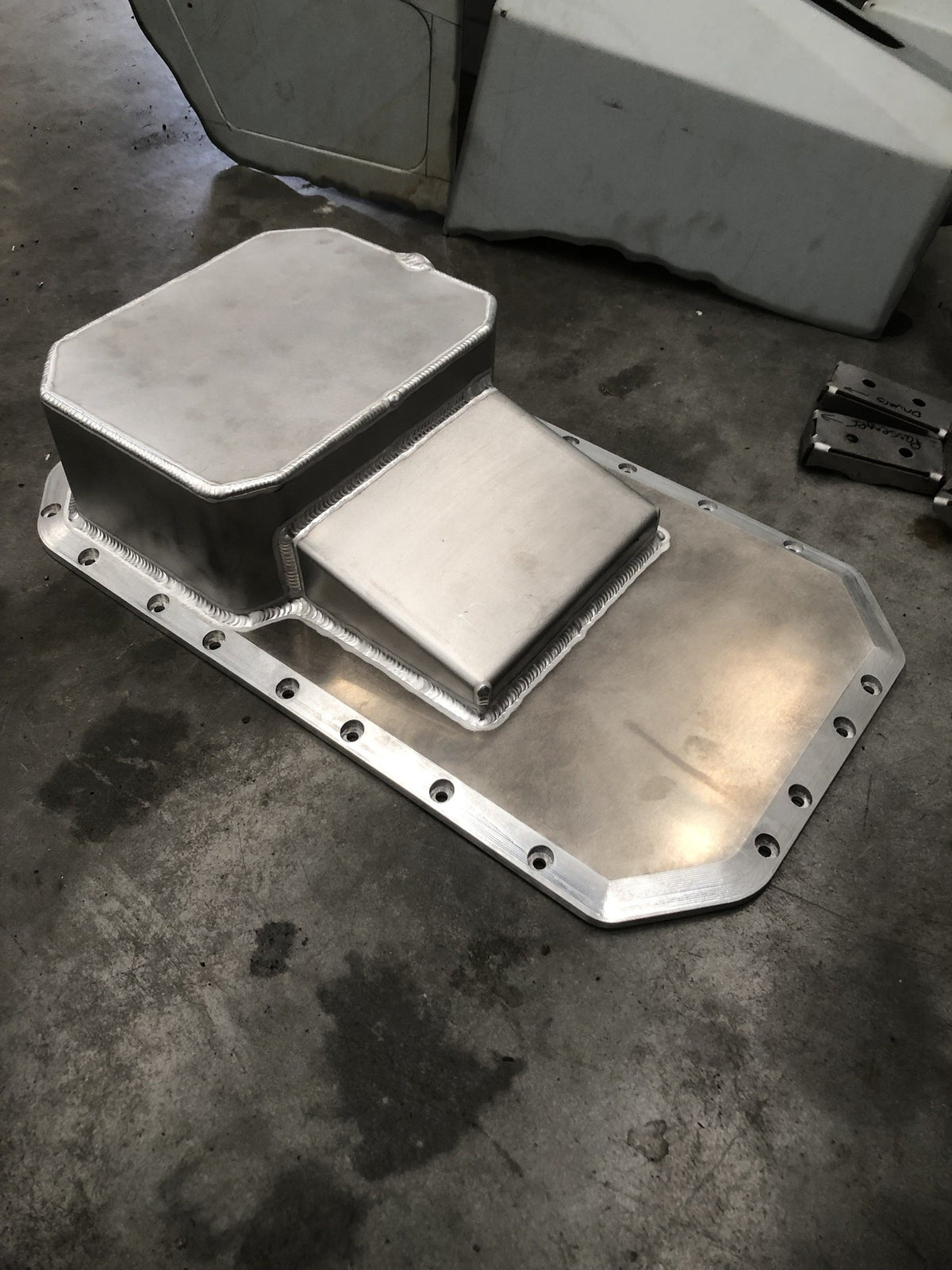 Custom TIG welded alloy sump with machined flange from the IMR Mazda 626 20B conversion kit