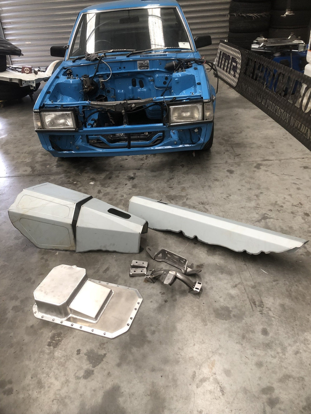 IMR Mazda 626 sedan 20B conversion kit: alloy sump, engine and transmission mounts and transmission tunnel, in front of the 626