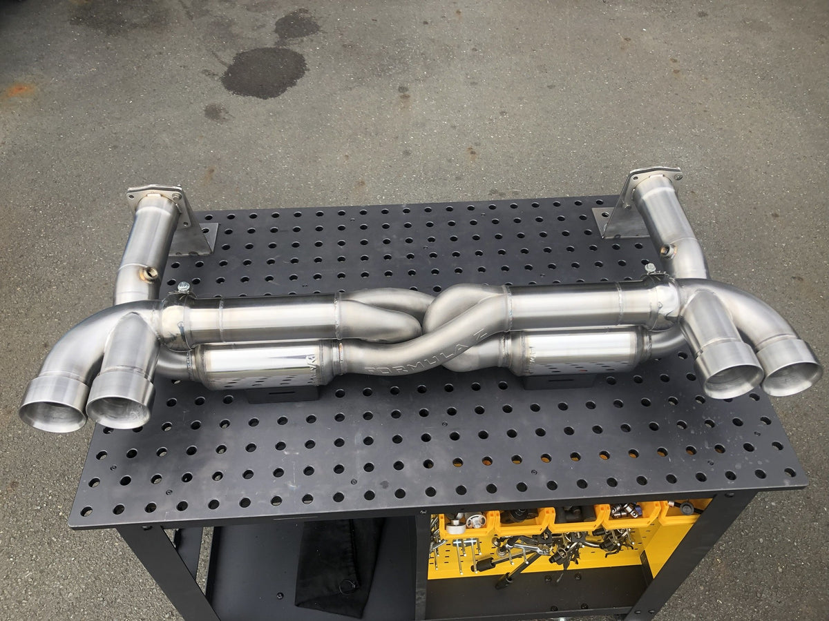 Top view of the IMR Porsche 997 Turbo stainless exhaust with Formula Z crossover pipe