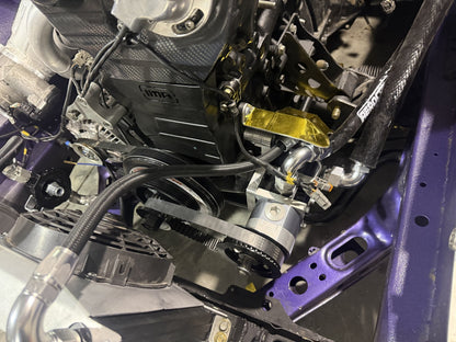 IMR dry sump pump mount installed beside the crank on an RB engine, with a toothed-belt pump drive